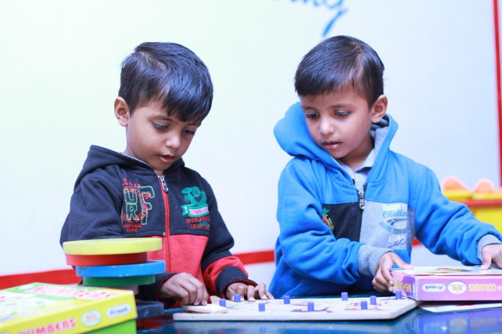 Preschool students learning through play with educational toys